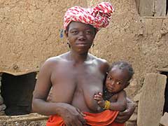 Dogon woman with her baby