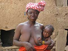 Dogon woman with her baby