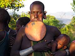 The Surma or the Suri People of the Omo Valley : Surma woman with a lip plate of clay.