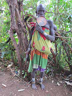 The Surma or the Suri People of the Omo Valley : Surma woman with a lip plate of clay.