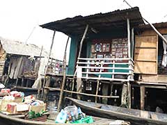 Makoko, a " Floating Slum " or shanty town on stilts in the center of Lagos