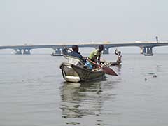 A young fisherman of Makoko, a " Floating Slum " or shanty town on stilts in the center of Lagos