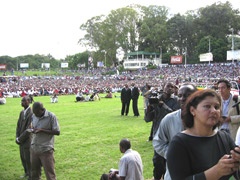 The press, and the people of Zimbabwe gathered together to hear the speach of the new Prime Minister.