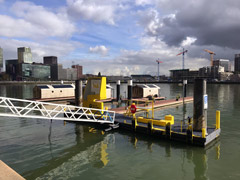 Neighbors to the Floating Office of Rotterdam: small floating houses for rent that can be used for meetings, picnics, or even as a hotel.