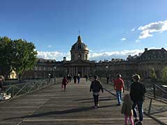 Le Pont des Arts ( Bridge of the Arts ) with the Académie française in the background.